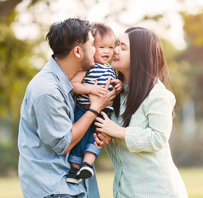 Caring Family With Their Child Caring Family With Their Child